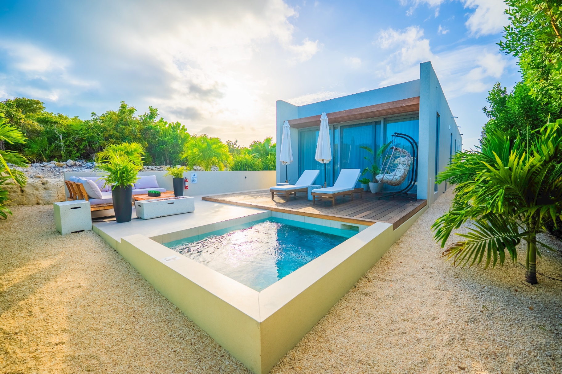 Villa Cyan plunge pool at sunset overlooking the lake in Providenciales